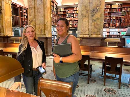 Middle Georgia State University School of Computing / Department of IT’s Cybersecurity Professor Kem Lingelbach and Graduate Student Adriana Glinsmann-Dee (right) chat quietly inside the Library of Congress’ Research room.